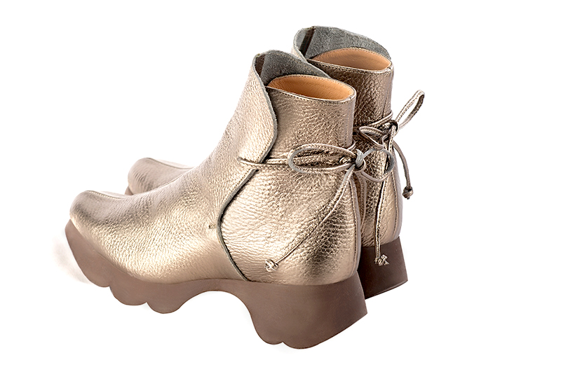 Tan beige women's ankle boots with laces at the back.. Rear view - Florence KOOIJMAN